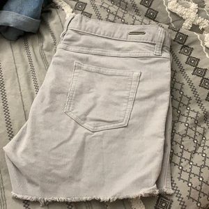 Grey shorts, carve designs